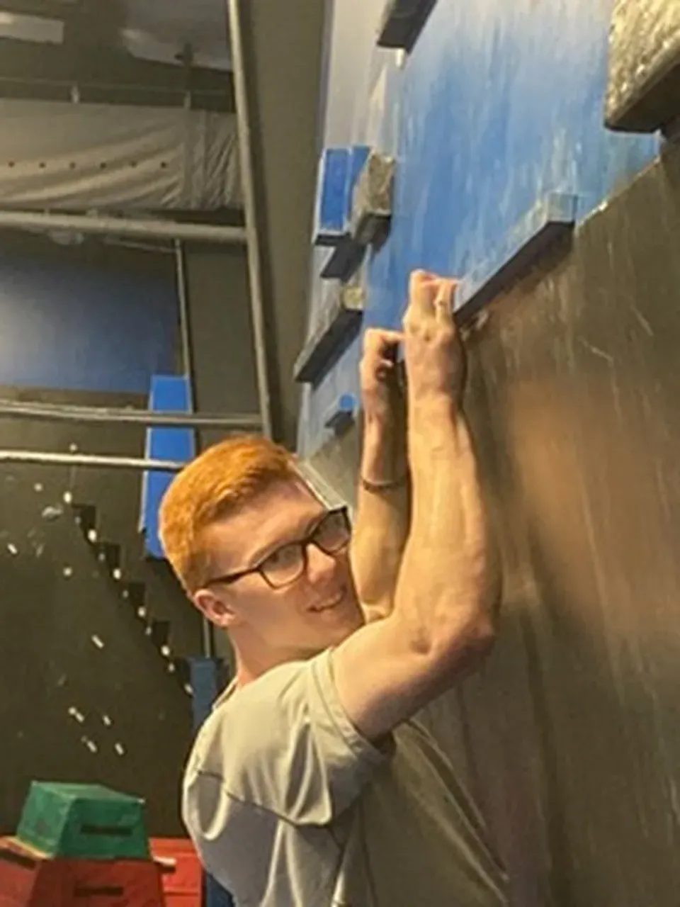 Zachary climbing a cliffhanger wall